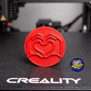 Heart Hands Coin