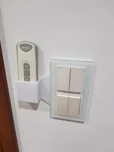 Remote Control holder attached to the light switch